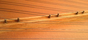 Strings can ride up the pins